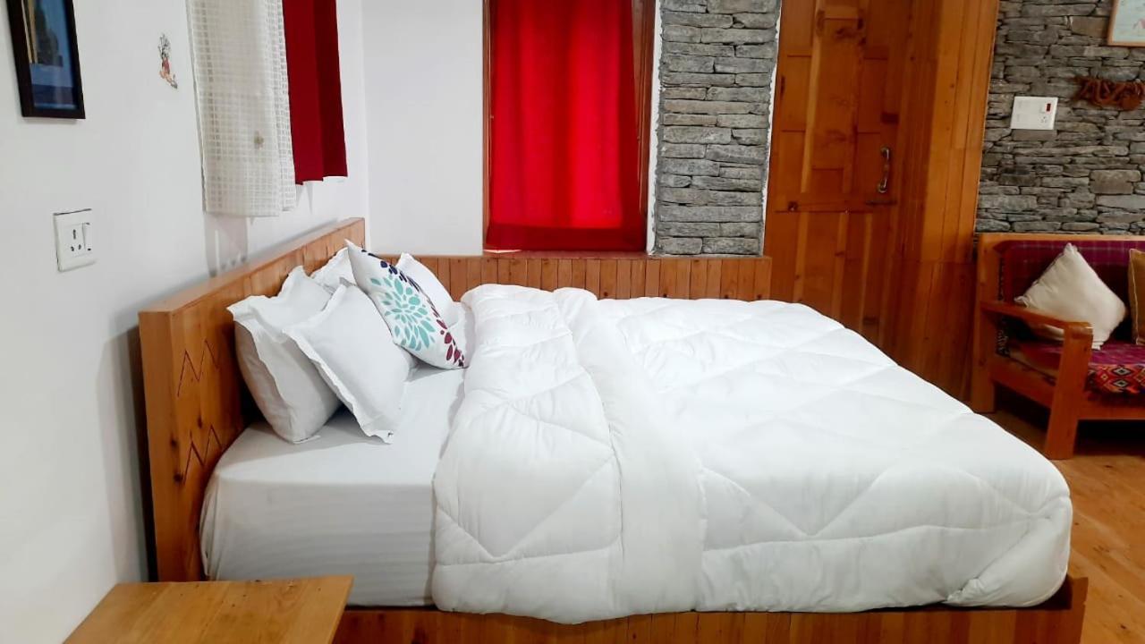 Ishan Log Huts-A Boutique Home Stay Banjar ภายนอก รูปภาพ