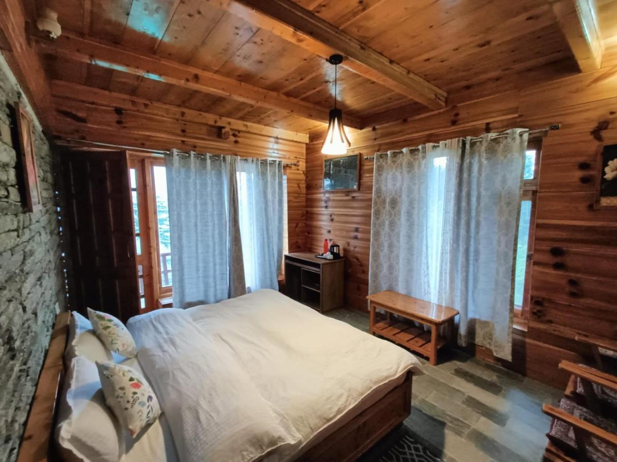 Ishan Log Huts-A Boutique Home Stay Banjar ภายนอก รูปภาพ