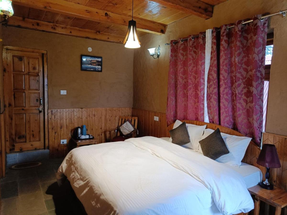 Ishan Log Huts-A Boutique Home Stay Banjar ภายนอก รูปภาพ