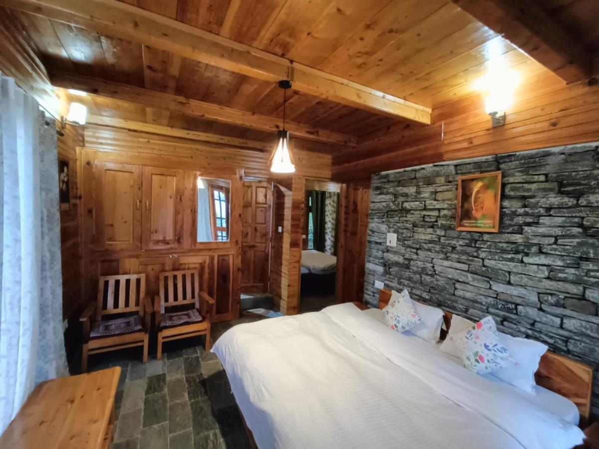 Ishan Log Huts-A Boutique Home Stay Banjar ภายนอก รูปภาพ