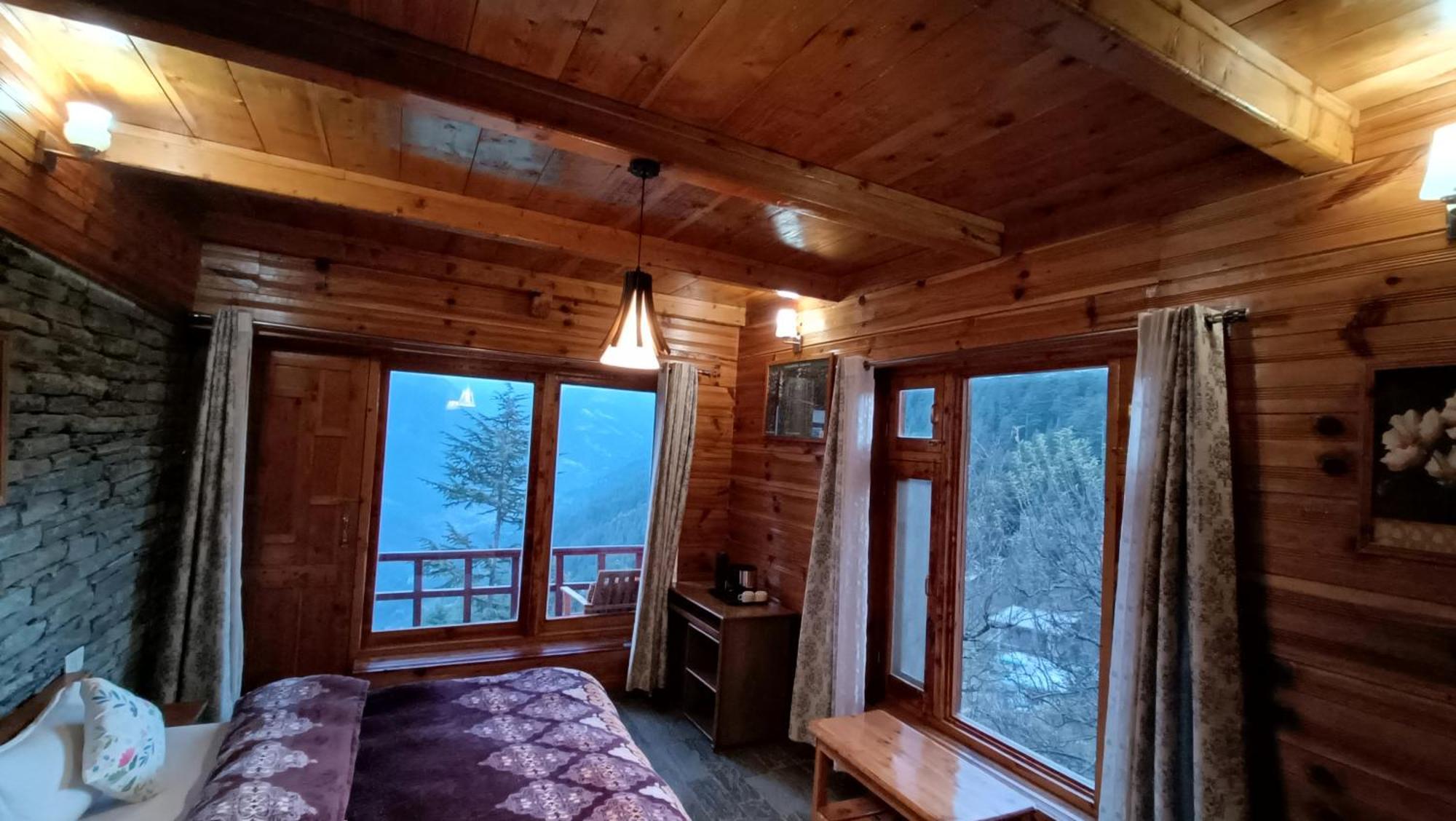 Ishan Log Huts-A Boutique Home Stay Banjar ภายนอก รูปภาพ