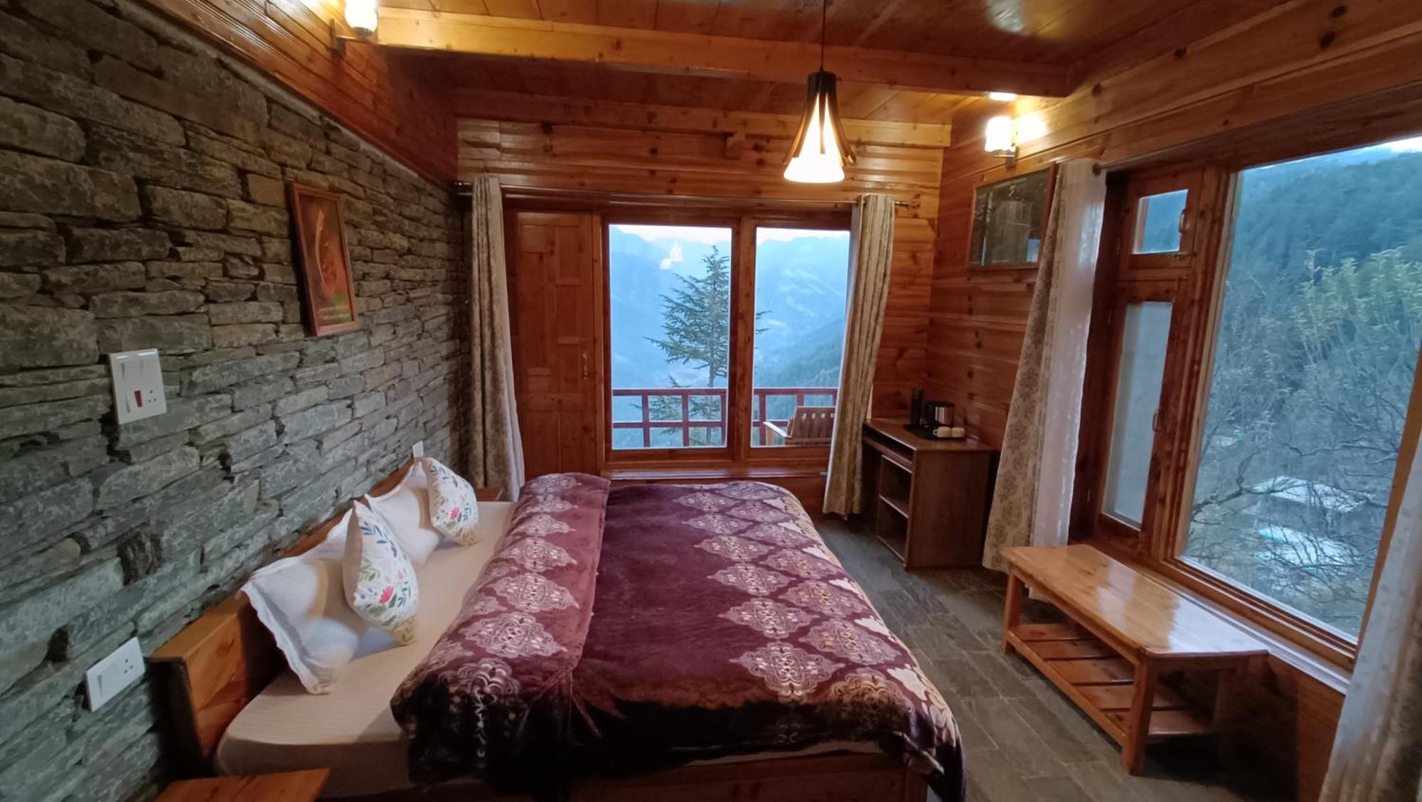 Ishan Log Huts-A Boutique Home Stay Banjar ภายนอก รูปภาพ